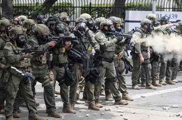 U.S. Border Patrol Clash with Protesters; National Guard Deployed